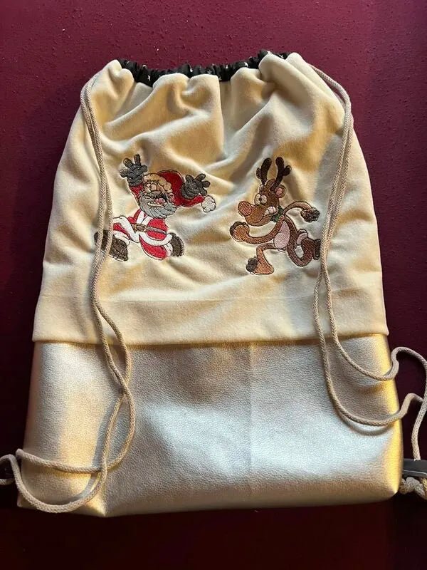 Stickdatei Running Elch und Nikolaus