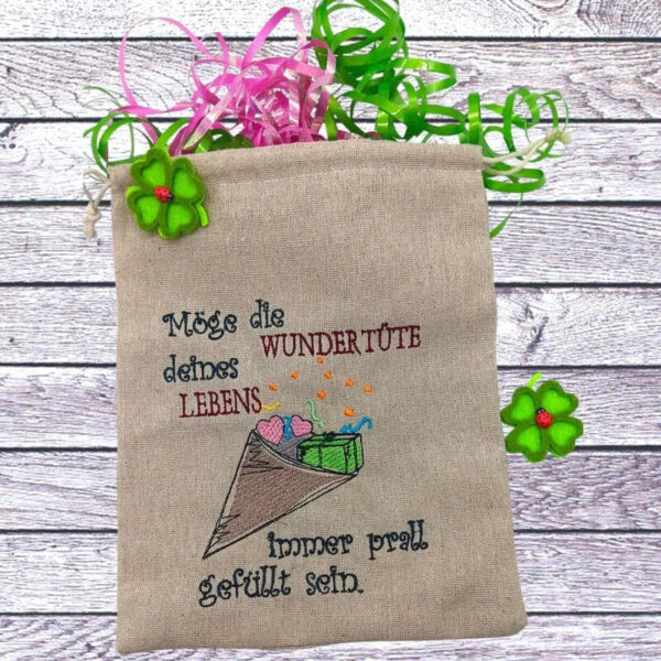 Stickdatei Wundertüte mit Spruch